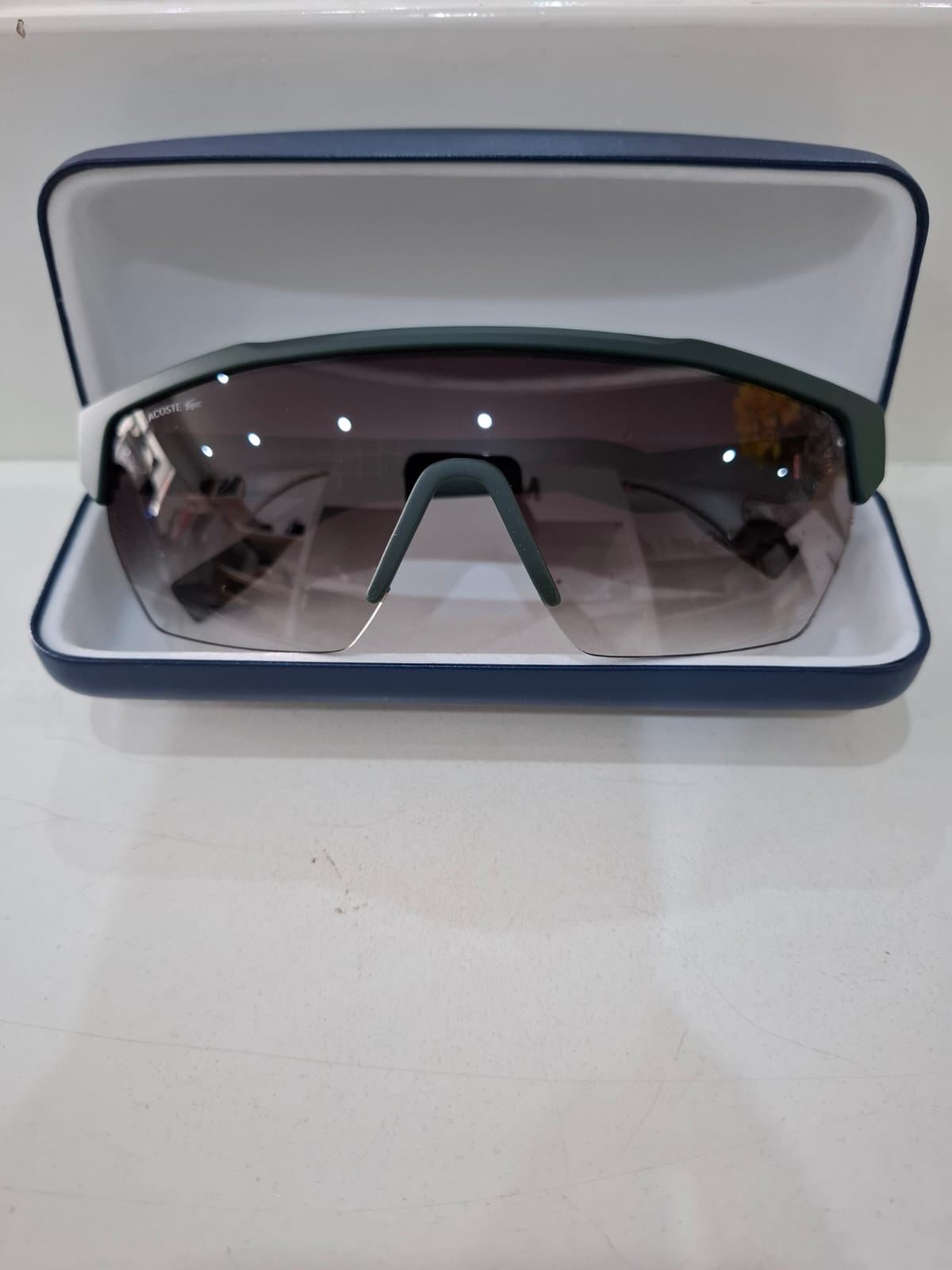 LENTES DE HOMBRE LACOSTE MARRONES CON BORDES VERDE OSCURO