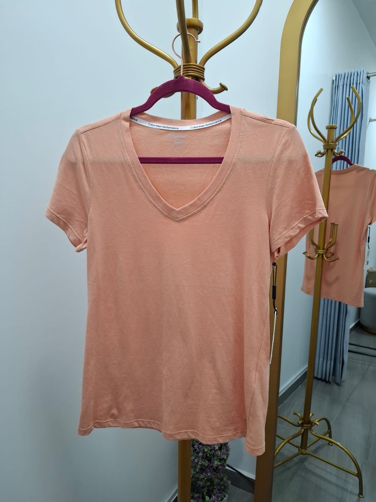 POLO DE MUJER CALVIN KLEIN PERFORMANCE COLOR SALMON - TALLA S